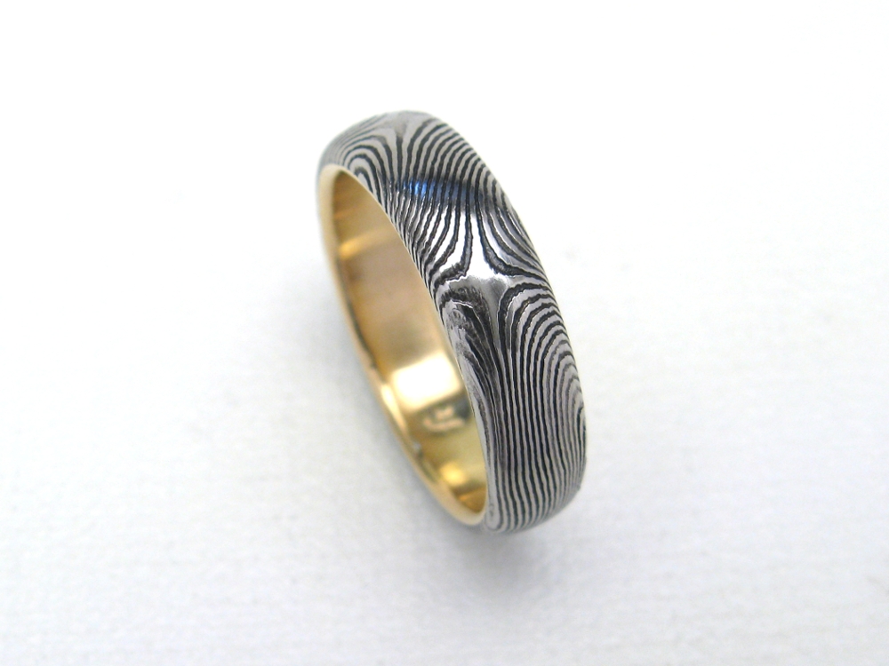 Stainless damascus ring w/ 18K gold lining