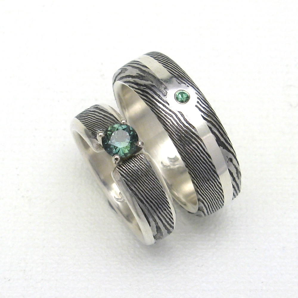 Stainless damascus ring set w/ tsavorite